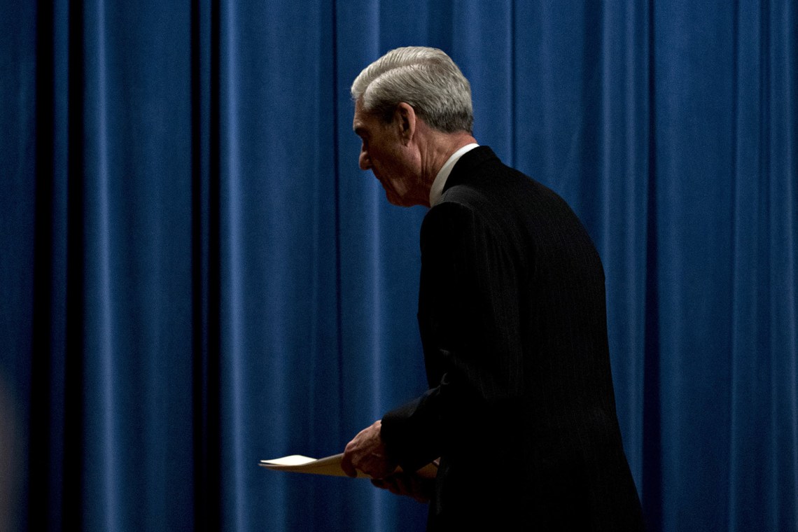 Robert Mueller after delivering a statement at the Department of Justice